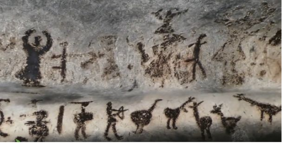 远古人类洞穴壁画与现代城市夜景的蒙太奇对比